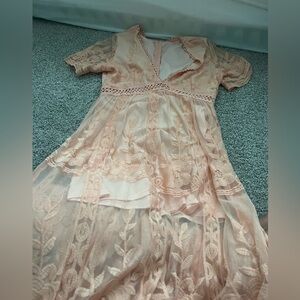 Peachy colored flowy floral boho maxi dress